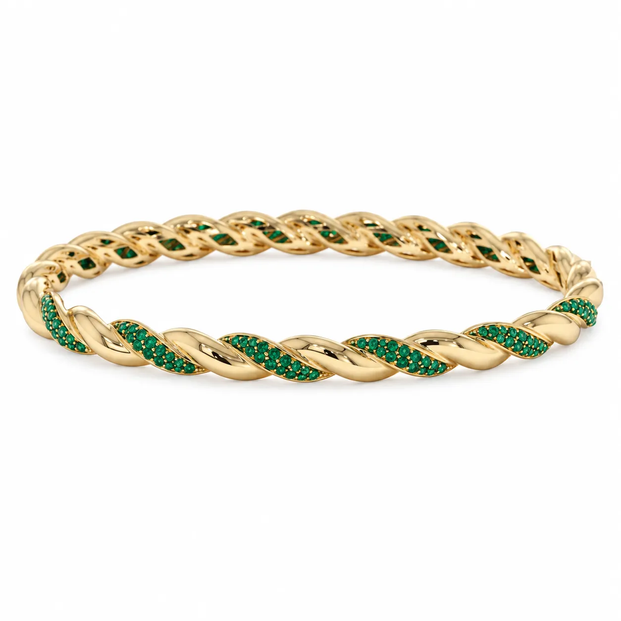 Yellow gold twisted bangle with pavé emeralds